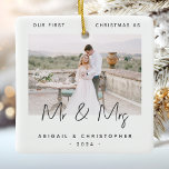 Minimalist Photo First Christmas as Mr & Mrs Grey Ceramic Ornament<br><div class="desc">Celebrate your first Christmas as a married couple with this modern minimalist photo keepsake ornament. The charcoal grey text reads "Our first Christmas as Mr & Mrs, " with the words "Mr & Mrs" in trendy handwriting script. Easily replace the sample image with your favourite photo, and add your names...</div>
