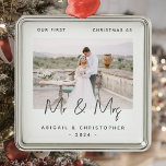 Minimalist Photo First Christmas as Mr & Mrs Grey Metal Ornament<br><div class="desc">Celebrate your first Christmas as a married couple with this modern minimalist photo keepsake ornament. The charcoal grey text reads "Our first Christmas as Mr & Mrs, " with the words "Mr & Mrs" in trendy handwriting script. Easily replace the sample image with your favourite photo, and add your names...</div>