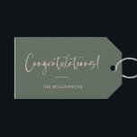 Minimalist Pink Dark Green Custom Congratulations Gift Tags<br><div class="desc">A sophisticated and timeless gift tag featuring a dark sage green background with elegant script and modern typography in pink. Perfect for adding a personalized touch to wedding gifts,  baby showers,  graduations,  or any celebratory occasion. Customize with your family name or message for a stylish and thoughtful finishing touch.</div>