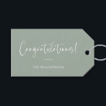 Minimalist Sage Green Personalized Congratulations Gift Tags<br><div class="desc">A sophisticated and timeless gift tag featuring a sage green background with elegant script and modern typography in white. Perfect for adding a personalized touch to wedding gifts,  baby showers,  graduations,  or any celebratory occasion. Customize with your family name or message for a stylish and thoughtful finishing touch.</div>