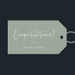 Minimalist Sage Green Personalized Congratulations Gift Tags<br><div class="desc">A sophisticated and timeless gift tag featuring a sage green background with elegant script and modern typography in white. Perfect for adding a personalized touch to wedding gifts,  baby showers,  graduations,  or any celebratory occasion. Customize with your family name or message for a stylish and thoughtful finishing touch.</div>