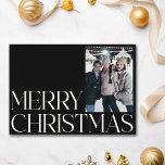 Minimalist Vintage Elegant Black 2 Photo Christmas Holiday Card<br><div class="desc">Celebrate the season with timeless style using this Minimalist Vintage Elegant Black 2 Photo Christmas Holiday Card. The sleek black background sets the stage for two of your favourite photos, framed in a simple yet sophisticated design. Perfect for those who appreciate vintage elegance with a modern twist, this card offers...</div>