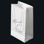 Minimalist White Black Bridal Shower Thank You Small Gift Bag<br><div class="desc">Make your bridal shower or special event extra memorable with this stylish personalized gift bag. Featuring a minimalist "thank you" in elegant script, this design blends modern sophistication with timeless charm. Perfect for bridal party gifts, wedding favours, or special thank-you treats, this customizable bag adds a thoughtful touch to any...</div>