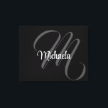 Minimalistic modern monogram initial name canvas print<br><div class="desc">Minimalistic modern monogram initial name black white. Personalizable custom name with a cursive initial behind on a black colour.</div>