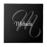 Minimalistic modern monogram initial name tile<br><div class="desc">Minimalistic modern monogram initial name black white. Personalizable custom name with a cursive initial behind on a black colour.</div>