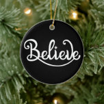 Minimalistic Modern Stylish Personalized Christmas Ceramic Ornament<br><div class="desc">Embrace the enchantment of the holiday season with our Minimalistic Modern Stylish Personalized Christmas Ceramic Ornament. This ornament is the perfect addition to your tree, capturing the essence of Christmas in a sleek and contemporary design. Featuring a black and white colour scheme and adorned with Santa Claus and reindeer, this...</div>