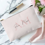 Minimalistic Monogram Initial & Name Pastel Pink Accessory Pouch<br><div class="desc">Organize your essentials in style with our Minimalistic Monogram Personalized Pastel Pink Initial & Name Cosmetic & Toiletry Bag. Featuring a soft pastel pink design with a custom monogram and name, this chic bag is perfect for keeping your cosmetics, toiletries, and other personal items neatly stored. Made from durable, high-quality...</div>