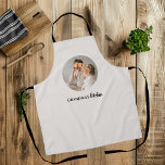 Minimalistic Photo | Grandma's Kitchen Gift  Apron<br><div class="desc">This charming apron is the perfect gift for any beloved grandma who loves spending time in the kitchen. Featuring a minimalistic design with a personal touch, this apron includes a photo of your choice to make it truly unique. Whether she's baking cookies or preparing a family feast, this apron will...</div>