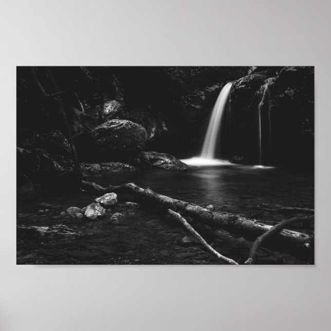 Minimalistic waterfall behind broken tree in black poster (Front)