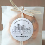 Minneapolis Skyline | Wedding Welcome Message Classic Round Sticker<br><div class="desc">Enhance your wedding welcome packages or event party favours with a custom set of welcome stickers! These elegant yet minimal-style stickers are tailored for a wedding taking place in the beautiful city of Minneapolis. They feature a modern deco skyline with the name of the city integrated underneath. All elements of...</div>