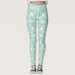 Mint Green Aqua Seafoam and White Print Leggings<br><div class="desc">With a mint green or aqua seafoam green background and an all over bold white geometric print these leggings are perfect for pairing with a white shirt or accenting your favourite pastel coloured tunic. Chevrons and flower petals shapes make for a lively pattern design on these tights.</div>
