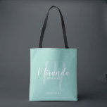 Mint Green Modern Script Personalized Bridesmaids Tote Bag<br><div class="desc">Add a personal touch to your wedding with personalized bridesmaids gift tote bag. This tote bag features personalized bridesmaid's name in white modern script font style and monogram in light green modern script font style as background with title and wedding date in white modern sans serif font style on mint...</div>