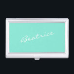 Mint Green Personalized Script Name Design Minimal Business Card Holder<br><div class="desc">This sleek business card case features a fresh mint green background with a custom name in elegant white script lettering. Ideal for professionals who want to add a stylish and personal touch to their daily essentials. This case is perfect for carrying and presenting your business cards at meetings, events, or...</div>