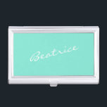 Mint Green Personalized Script Name Design Minimal Business Card Holder<br><div class="desc">This sleek business card case features a fresh mint green background with a custom name in elegant white script lettering. Ideal for professionals who want to add a stylish and personal touch to their daily essentials. This case is perfect for carrying and presenting your business cards at meetings, events, or...</div>