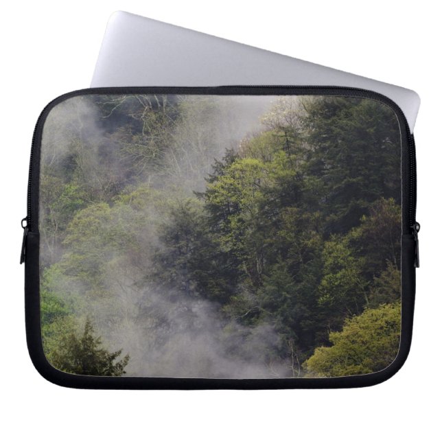 Mist rising from mountainside after spring rain, laptop sleeve (Front)