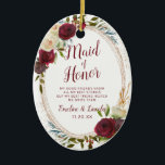 Mistletoe Manor Floral To the Maid of Honour Quote Ceramic Ornament<br><div class="desc">Mistletoe Manor Watercolor Lush Roses Design with Hand Painted Florals, Holly Berry Leaves, Pine Sprig Foliage, and Watercolor Paint Brush Strokes. Colourful Marsala, Wine Merlot Red, Burgundy, Ivory Cream, and Green. With Swirly Chic Typography Brush Script Fonts and Rose Gold Elegant Floral Oval Frame - Maid of Honour Heartfelt Quote...</div>