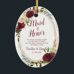 Mistletoe Manor Floral To the Maid of Honour Quote Ceramic Ornament<br><div class="desc">Mistletoe Manor Watercolor Lush Roses Design with Hand Painted Florals, Holly Berry Leaves, Pine Sprig Foliage, and Watercolor Paint Brush Strokes. Colourful Marsala, Wine Merlot Red, Burgundy, Ivory Cream, and Green. With Swirly Chic Typography Brush Script Fonts and Rose Gold Elegant Floral Oval Frame - Maid of Honour Heartfelt Quote...</div>