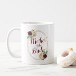 Mistletoe Manor Rose Gold Oval Mother of the Bride Coffee Mug<br><div class="desc">Mistletoe Manor Watercolor Lush Winter Roses Design with Hand Painted Florals, Holly Berry Leaves, Pine Sprig Foliage, and Watercolor Paint Brush Strokes. Colourful Marsala, Wine Merlot Red, Burgundy, Ivory Cream, and Green. With Swirly Chic Typography Brush Script Fonts and Elegant Rose Gold Glitter Foil Confetti Oval Frame - Mother of...</div>
