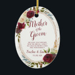 Mistletoe Manor To the Mother of the Groom Quote Ceramic Ornament<br><div class="desc">Mistletoe Manor Watercolor Lush Roses Design with Hand Painted Florals, Holly Berry Leaves, Pine Sprig Foliage, and Watercolor Paint Brush Strokes. Colourful Marsala, Wine Merlot Red, Burgundy, Ivory Cream, and Green. With Swirly Chic Typography Brush Script Fonts and Rose Gold Elegant Floral Oval Frame - Mother of the Groom Heartfelt...</div>