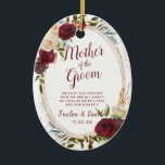 Mistletoe Manor To the Mother of the Groom Quote Ceramic Ornament<br><div class="desc">Mistletoe Manor Watercolor Lush Roses Design with Hand Painted Florals, Holly Berry Leaves, Pine Sprig Foliage, and Watercolor Paint Brush Strokes. Colourful Marsala, Wine Merlot Red, Burgundy, Ivory Cream, and Green. With Swirly Chic Typography Brush Script Fonts and Rose Gold Elegant Floral Oval Frame - Mother of the Groom Heartfelt...</div>