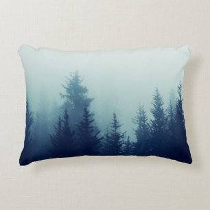 Misty fog in pine forest on mountain slopes. Colou Accent Pillow