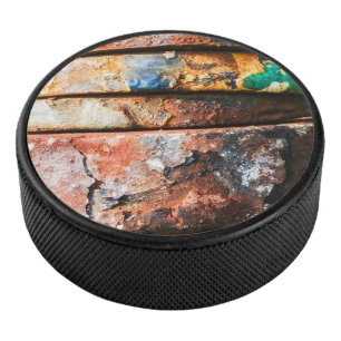 mixed metal race to cake hockey puck