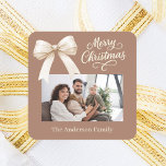 Mocha coffee cream bow photo script Christmas Square Sticker<br><div class="desc">A muted mocha coffee background,  cream coloured text and a bow. Merry Christmas is written with an elegant hand-lettered style font. Personalize and add your family name.</div>