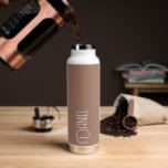 Mocha Modern Typography Personalized Water Bottle<br><div class="desc">Trendy,  vacuum insulated water bottle that features personalized name in white,  modern typography on a mocha colour background. Personalize bottle by editing name and replacing name with your own as desired. Perfect for a birthday gift,  wedding groomsman gift,  etc. Select your water bottle style.</div>