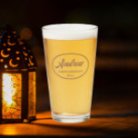 Mocha Stylized Wedding Groomsman Name Glass<br><div class="desc">Beer glass for the wedding groomsman that features his name printed in a trendy mocha colour, stylized script inside a mocha colour oval border along with wedding date. A great party supply idea for a bachelor party! Personalize your beer glass by editing and replacing name and date with your own....</div>