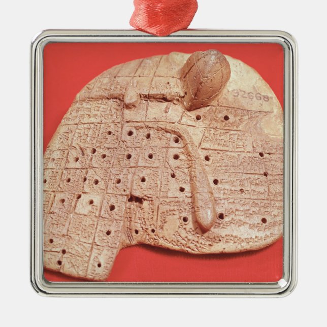 Model of a sheep's liver metal ornament (Front)