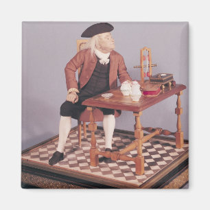 Model of Benjamin Franklin at his table Magnet
