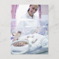 MODEL RELEASED. Nurse and premature baby.