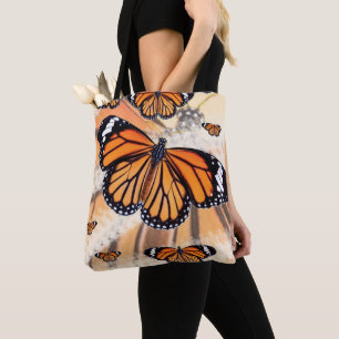 Modèle de papillon monarque sur sac fourre-tout