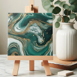 Modern Abstract Emerald Green and Gold Marble Tile<br><div class="desc">Introducing our stunning ceramic tile, a captivating piece of art that effortlessly combines elegance and modern design. This tile features a mesmerizing abstract pattern reminiscent of swirling ocean waves, with rich emerald green hues blending seamlessly with creamy whites and shimmering gold accents. The intricate marbling effect creates a sense of...</div>