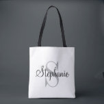 Modern and Elegant Black Personalized Monogram Tote Bag<br><div class="desc">Modern and elegant tote bag features a simple and minimal custom grey and black (colours can be modified) personalized monogram design that can be personalized with an initial and name in script. Perfect gift for the special lady in your life... .mom, sister, daughter, aunt, grandma and best friend. Easy to...</div>