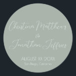 Modern and Elegant Eucalyptus Wedding Classic Round Sticker<br><div class="desc">This modern and elegant event or wedding sticker features a simple eucalyptus green background with white text. The names of the couple are printed in a script font. The wedding date and location are printed below.</div>