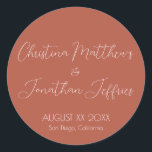 Modern and Elegant Terracotta Wedding Classic Round Sticker<br><div class="desc">This modern and elegant event or wedding sticker features a simple terracotta background with white text. The names of the couple are printed in a script font. The wedding date and location are printed below.</div>