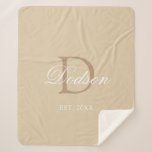 Modern Beige Newlywed Established Year Monogram Sherpa Blanket<br><div class="desc">Modern Beige Newlywed Established Year Monogram Sherpa Blanket Designed with customizable light beige background and light brown monogram initial on the centre. Personalized with couple's last name in classy white calligraphy script lettering and established year is on lower front centre. Makes a great housewarming or bridal shower gift idea. CLICK...</div>