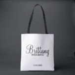 Modern Black and White Personalized Bridesmaids Tote Bag<br><div class="desc">Modern Black and White Personalized Bridesmaids Gifts
featuring personalized bridesmaid's name in modern calligraphy font style with title and wedding date in modern sans serif font style.

Also perfect for Maid of Honour,  Flower Girl,  Mother of the Bride and more.</div>