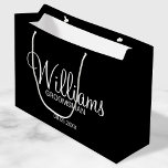 Modern Black and White Personalized Groomsman Large Gift Bag<br><div class="desc">Modern Black and White Personalized Groomsman Gifts
featuring personalized groomsman's name in white modern script font style with title and wedding date in modern sans serif font style on black background.

Also perfect for best man,  father of the bride,  bridesmaid,  maid of honour,  mother of the bride and more.</div>