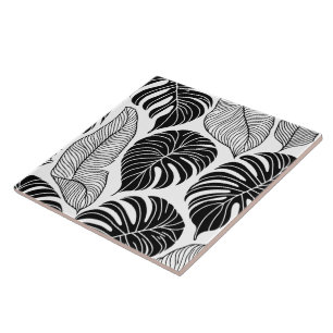 Modern black and white tropical leaves tile
