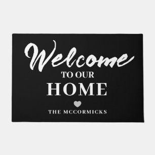 Modern Black And White Welcome Script Family Name Doormat