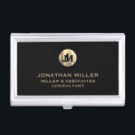 Modern Black Brushed Metallic Gold Monogram Business Card Holder<br><div class="desc">Elevate your professional look with this stylish and practical business card case. Featuring a brushed monogram medallion with your name company and title in classic block typography, this case is a great way to keep your business cards organized and protected. The black background adds a touch of sophistication, while the...</div>