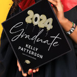 Modern Black Gold Balloons 2024 Graduation Cap Topper<br><div class="desc">Modern graduation cap topper featuring a trendy black background that can be changed to any colour,  watercolor gold 2024 balloons,  their name,  and the high school or college they attended.</div>