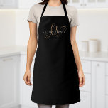 Modern Black Gold Feminine Script Monogrammed Apron<br><div class="desc">Modern Black Gold Feminine Script Monogrammed Apron. Easily personalize this modern elegant apron with your custom monogram and name.</div>