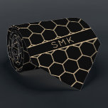 Modern Black Gold Foil Geometric Monogram Tie<br><div class="desc">Modern Black and Gold Foil Geometric Monogram Necktie in a stylish pattern of gold hexagons on an elegant black background. Easy to customize with text, fonts, and colours. Created by Zazzle pro designer BK Thompson © exclusively for Cedar and String; please contact us at cedarandstring@gmail.com if you need assistance, have...</div>