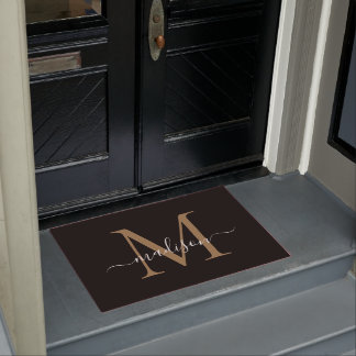 Modern Black Gold Monogram Feminine Script Name Doormat
