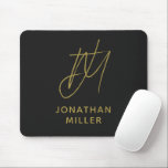 Modern Black Gold Monogram Mouse Pad<br><div class="desc">Keep your workspace stylish and functional with this Modern Black Gold Monogram Mouse Pad. The sleek design features a customizable monogram on a black background, and the non-slip rubber base ensures a secure grip on any surface. Perfect for both personal and professional use, this mouse pad is a great way...</div>