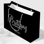 Modern Black Personalized Bridesmaids Large Gift Bag<br><div class="desc">Modern Personalized Bridesmaids Gifts
featuring personalized bridesmaid's name in white modern calligraphy font style with title and wedding date in white modern sans serif font style on black background.

Also perfect for Maid of Honour,  Flower Girl,  Mother of the Bride and more.</div>