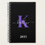 Modern Black Purple Script Monogram Planner<br><div class="desc">This simple, elegant black 5.5 x 8.5 soft planner with your first name in a trendy script font in white typed over your first initial in a modern cap font in purple is perfect for you. It's stylish and trendy and yet very classic. It will make keeping appointments, meetings, deadlines,...</div>
